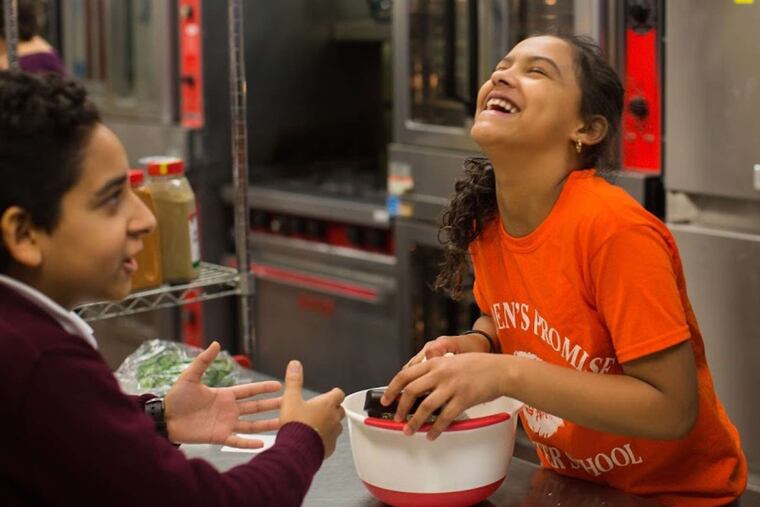 Camden Promise Charter School students Joaquin Estevez and Ceanni Fernandez.