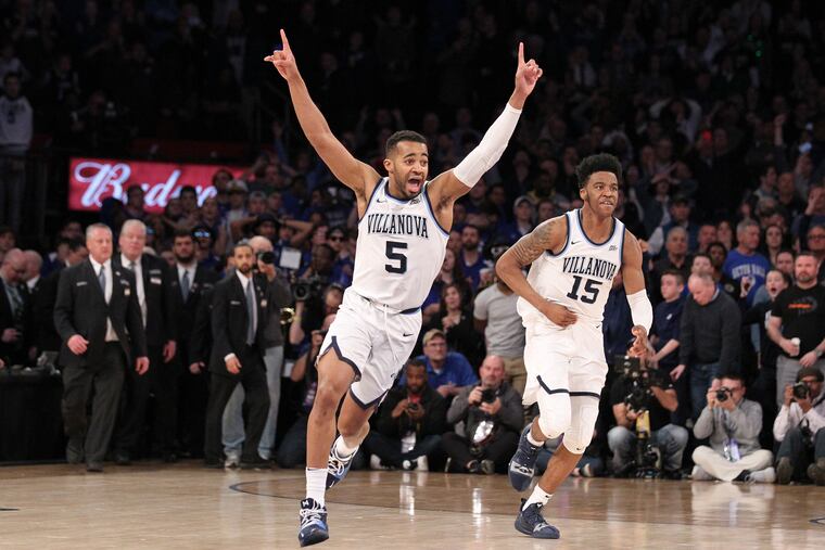 Phil Booth, left, and Saddiq Bey of Villanova at the end of their victory over Seton Hall in the Big East Tournament Championship on March 16, 2019.