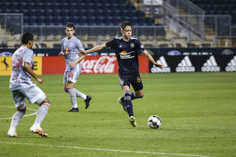 Jack McGlynn, right, playing for the Union's USL team against the New York Red Bulls' USL team on Aug. 5.