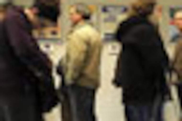 Hundreds of people waited in line between 5 and 6 p.m., to vote at First Alliance Church in Millcreek Township, near Erie, Pa., on Tuesday, Nov. 6, 2012. One of them was Jim Ertl, center, background, facing the camera. "Voting is important and is my right," said Ertl, who waited an hour to vote. "The wait doesn't matter."(AP Photo/Erie Times-News, Christopher Millette) MAGS OUT, TV OUT