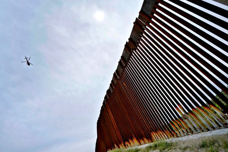 A section of the border wall at the base of the Baboquivari Mountains near Tucson, Arizona.
