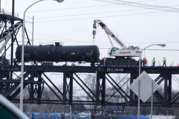 The Schuylkill Arsenal Bridge, where rail tank cars carrying crude oil derailed Jan. 20. There have been problems with crude being carried by rail. (David M Warren / Staff Photographer)