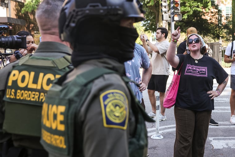 ICE will continue its enforcement activities through the shutdown. In Chicago, pedestrians yelled at federal Border Patrol agents who stood on North Clark Street at West Oak Street in River North, Sunday.