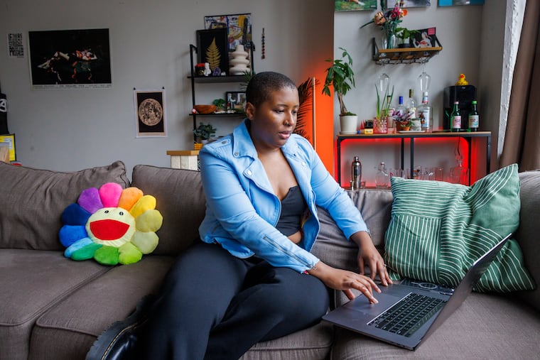 Qualeasha Wood in her apartment on N. 12th Street where she is living after moving to Philadelphia from NYC. Photograph taken on Friday, April 28, 2023.