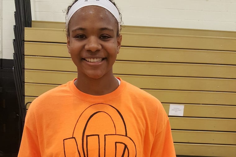 Morrestown’s Faith Bonett wearing the T-shirt her team dedicated to the school’s late athletic director, Neil Rosa.