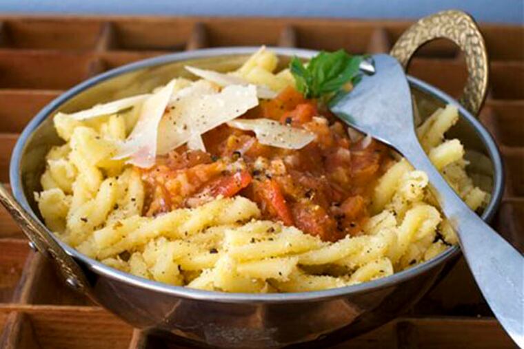 In this image taken on February 18, 2013, gemilli pasta with anchovies and breadcrumbs is shown served in a bowl in Concord, N.H. (AP Photo/Matthew Mead)