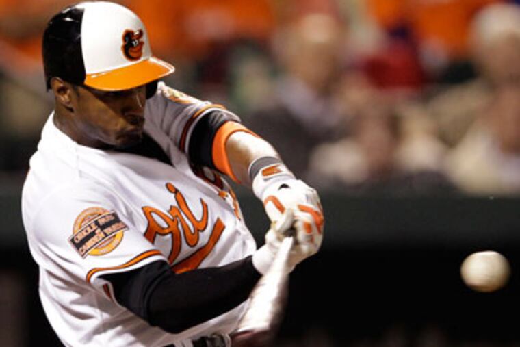 Baltimore Orioles' Adam Jones hits a solo home run in the eighth
inning of a baseball game against the Toronto Blue Jays in Baltimore,
Thursday, April 26, 2012. Baltimore won 5-2. (AP Photo/Patrick
Semansky)