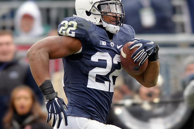 Penn State's Akeel Lynch rushes for a touchdown in the second half of
against Temple in an NCAA college football game, Saturday, Nov. 15. 2014, at Beaver Stadium in State College, Pa.Penn State won 30-13. (AP Photo/York Daily Record, Chris Dunn)
