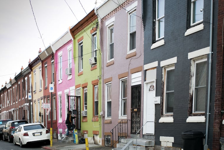 Row homes line Potter and Custer Streets in Kensington.
