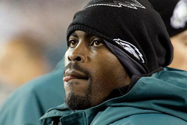 Michael Vick has admitted that he has yet to talk to Andy Reid about his contract. (Elizabeth Robertson / Staff Photographer)