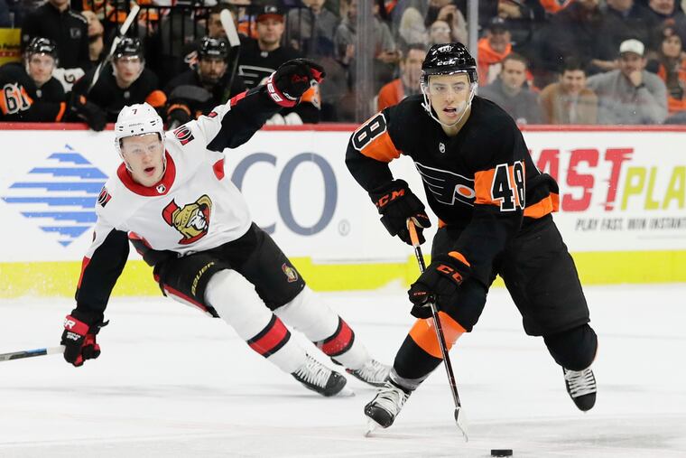 Center Morgan Frost (right) is back in the Flyers' lineup Saturday in Washington.