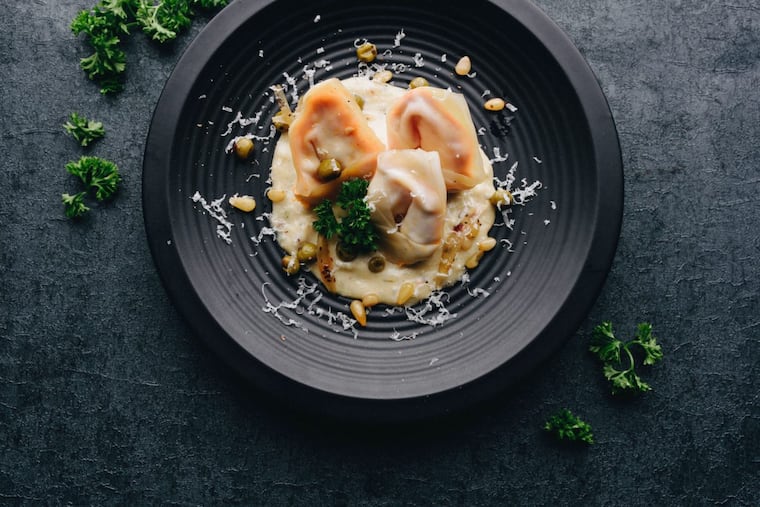 Sweet potato and buffalo chicken ravioli, as photographed for the upcoming Whisk cookbook.