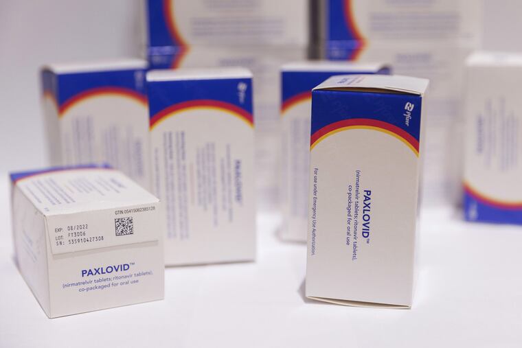 Boxes of Pfizer's Paxlovid antiviral medication arranged in a warehouse in Shoham, Israel.