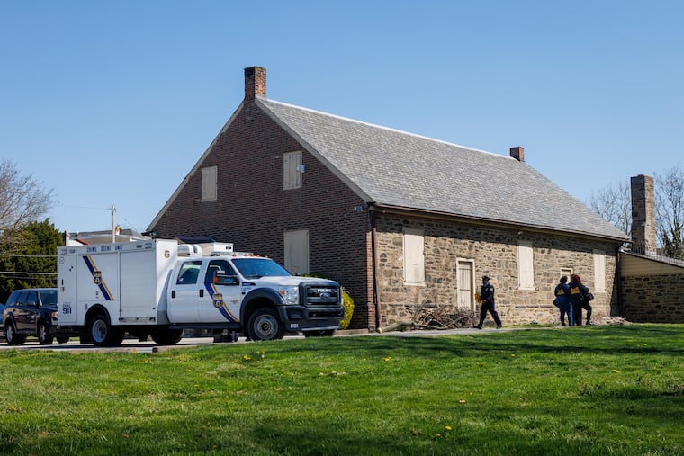 Philadelphia Crime Scene detectives examine a behavioral health center in Frankford where Carol Clark's body was found. Clark was drugged and shot by her youngest son, Sean Rivera, according to police.