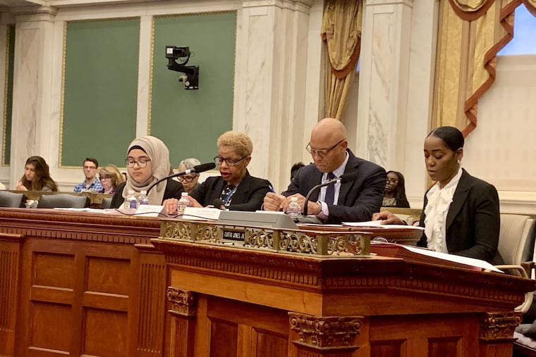 Philadelphia Schools Superintendent William R. Hite Jr. appeared before City Council during budget hearings Tuesday. He was joined by student Doha Ibrahim, left, School Board president Joyce Wilkerson, second from left, and Asmeret Easley, a teacher at Overbrook Education Center, right.
