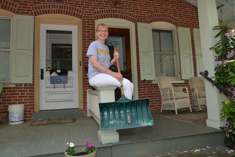 Jenny Steinen, a 6th grade school teacher and former lawyer from West Chester recently won her battle in court that proved she had in fact shoveled her sidewalk of snow this past winter. She was fined and successfully challenged the ticket. She has her trusty snow shovel in hand by her home on W. Union St. in West Chester on June 1, 2018.