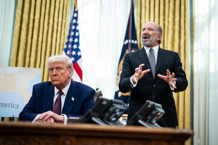 Commerce Secretary nominee Howard Lutnick speaks after President Donald Trump signed an executive order in the Oval Office.