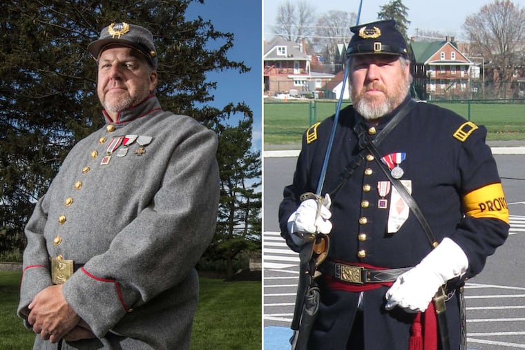 David Hann, commander of the New Jersey chapter of the Sons of Confederate Veterans, stands in his replica Confederate, left, and Union, right, uniforms.