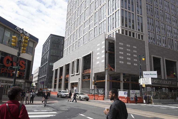 Construction continues on The Ludlow building which will have retail on the lower floors and residential space in the tower above it.