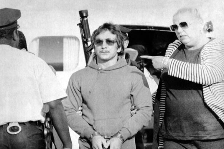 Fugitive Joseph Kindler gets off a plane at Philadelphia International Airport in September 1991, to be turned over to police. He had been hiding in Canada from authorities.