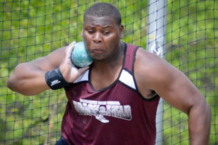 Shot putter Braheme Days demonstrates his winning style in the Woodbury Relays. (Ron Tarver / Staff Photographer )