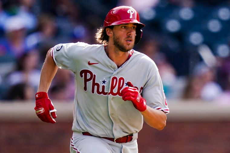 Aaron Nola had a historic outing on the mound Friday in the first half of a doubleheader against the Mets. He ended up having to carry the Phillies at the plate, too.