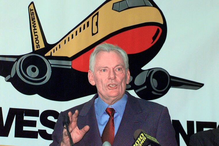 FILE - In this Dec. 9, 1998, file photo, Southwest Airlines President and CEO Herb Kelleher speaks at a news conference at MacArthur Airport in Islip, N.Y. Kelleher died on Thursday, Jan. 3, 2019. He was 87.