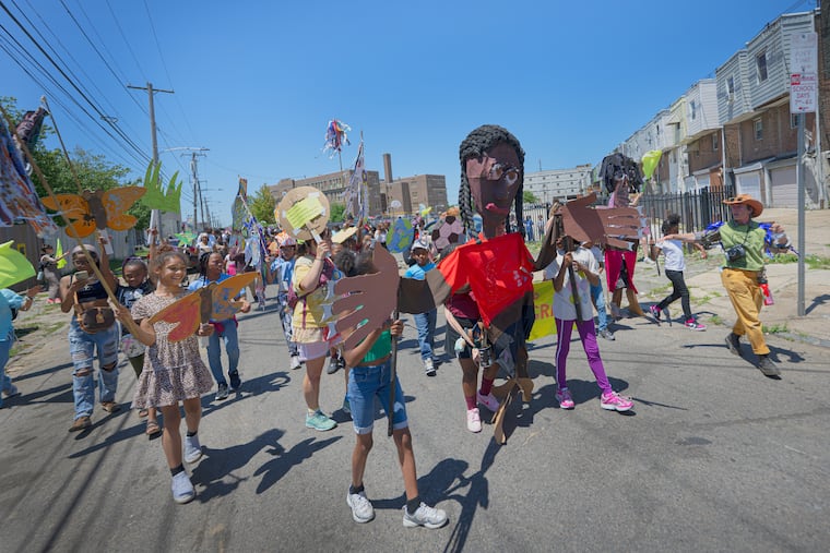 Blankenburg Elementary School students parade, Wednesday, June 3, 2026, in Philadelphia. The parade celebrates students' identities and causes they care about through giant puppets, original chants, drumming and other artwork. Blankenburg is among 17 Philadelphia schools recently approved for closure by the school board.