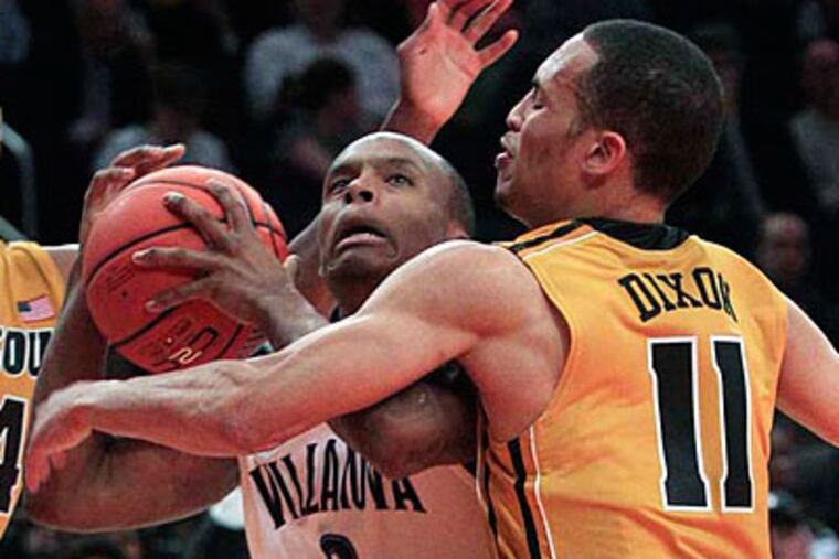 Missouri's Michael Dixon, right, defends Villanova's Maalik Wayns. Wayns scored 14 points for the Wildcats. (Frank Franklin II/AP Photo)