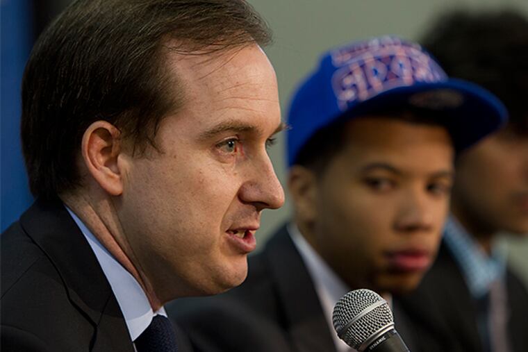 Sam Hinkie and Michael Carter-Williams together after the 2013 NBA draft, but midway through this season, MCW was gone. (Alejandro A. Alvarez/Staff file photo)