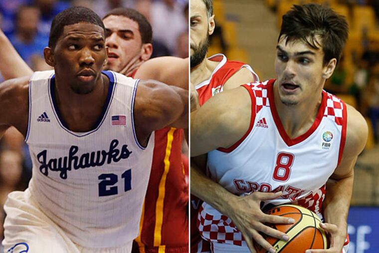 New Sixers Joel Embiid and Dario Saric. (AP Photos)