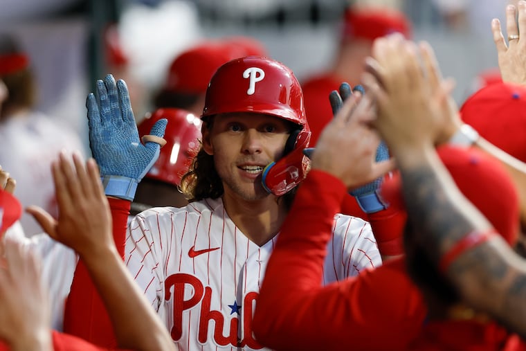 The Phillies' Alec Bohm celebrates his home run against the Reds on Monday.