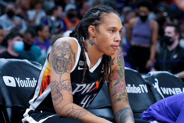 Brittney Griner on the Phoenix Mercury bench during a WNBA Finals game in October 2021.