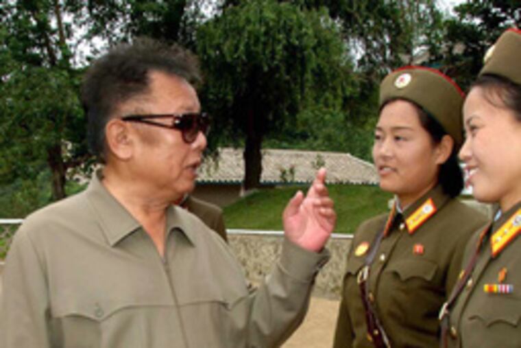 Above, a photo of Kim Jong Il released in August. At right, a picture released Saturday showing him in a similar setting. He vanished from public view in mid-August. North Korea has denied reports he had a stroke.