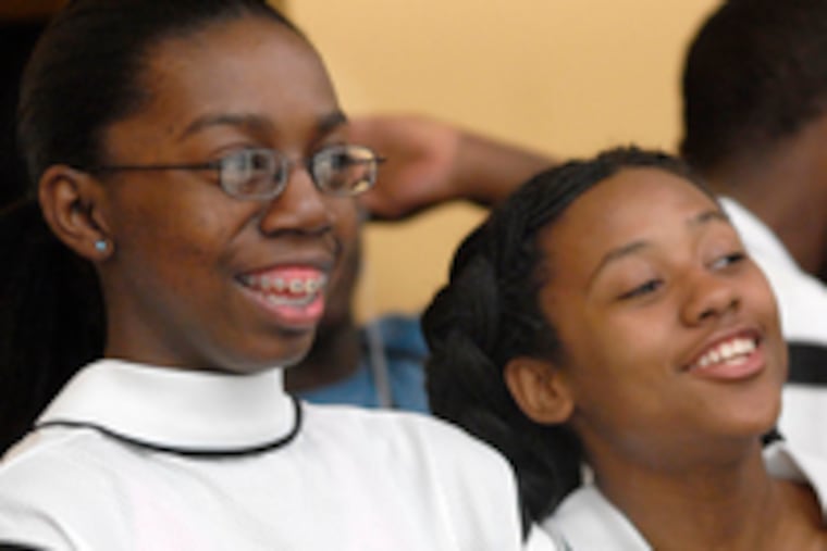 Quinetta Bowden (left), with Brittany Kennedy, wants to be a lawyer, and SquashSmarts, she said, showed her "whatI want is not far-fetched."