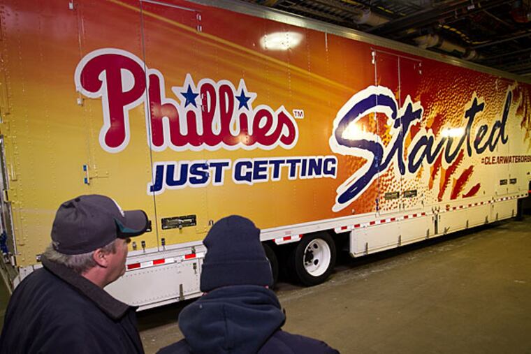 Marty Garland (left) is the driver of the Phillies spring training tractor trailer that will be heading south to Florida with team supplies. (Alejandro A. Alvarez/Staff Photographer)