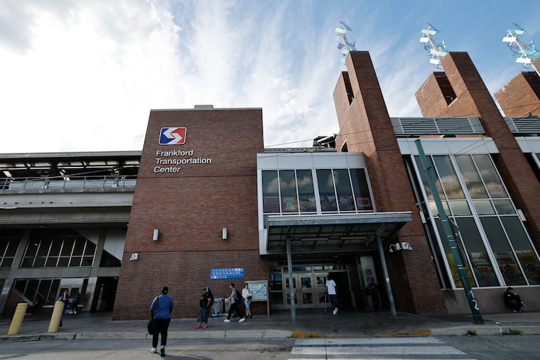 Riders wait at the SEPTA Frankford Transportation Center in August.