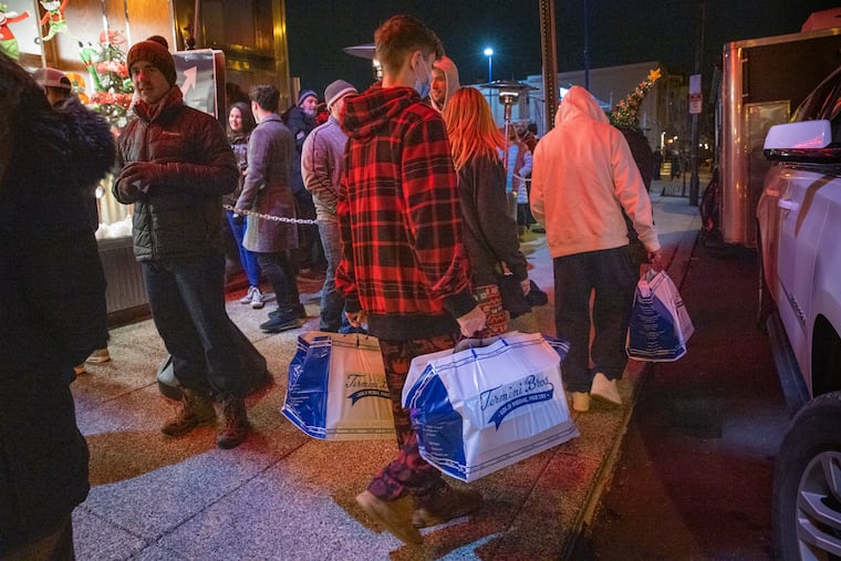 The Sauder family of Huntingdon Valley brought friends to help carry their large assortment of traditional Italian pastries.