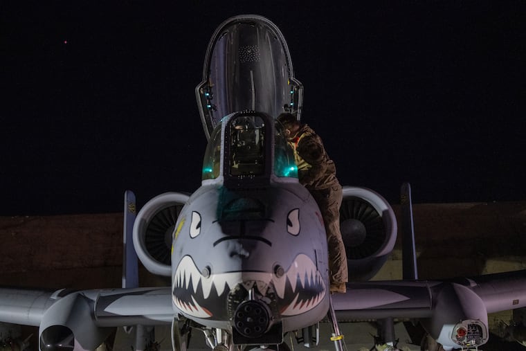 This photo provided by the U.S. Air Force shows a U.S. airman preparing an A-10 Thunderbolt II for flight from a base in the U.S. Central Command area of responsibility, Friday, Dec. 19, 2025, in support of Operation Hawkeye Strike.