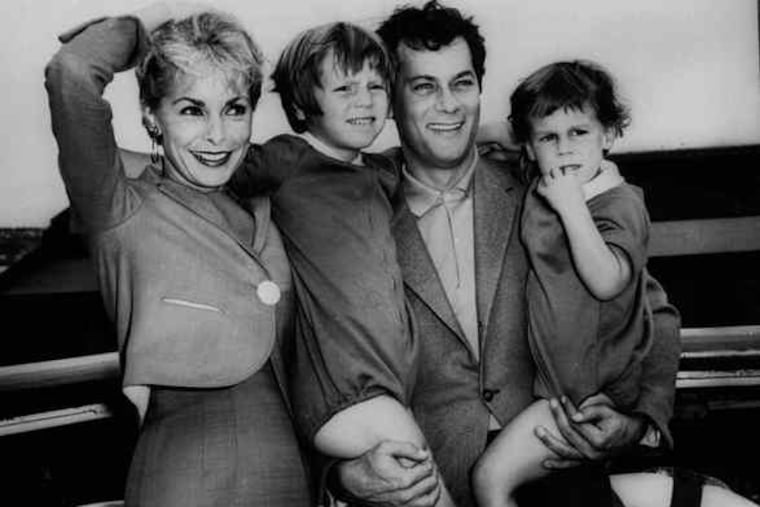 Tony Curtis and Janet Leigh pose with their children, Kelly, 5, and Jamie, 21/2, in 1961 before departing for Argentina and the filming of "Taras Bulba," in which he costarred with Yul Brynner.