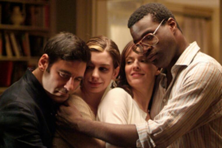 Tunde Adebimpe (right) of TV on the Radio is also an actor.He appears in the new "Rachel Getting Married" with (from left) Mather Zickel, Anne Hathaway and Rosemarie DeWitt.