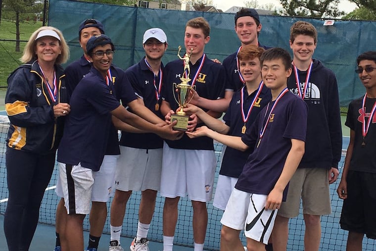 Unionville celebrates winning the District 1 title.