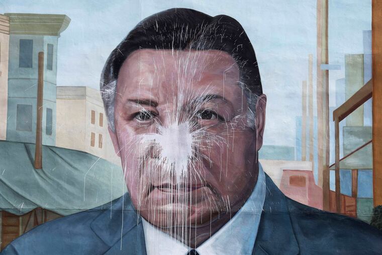 The mural "A Tribute to Frank Rizzo" in the Italian Market is vandalized Saturday, August 19, 2017, two days after the Rizzo statue at the Municipal Services Building was spray painted. The Rizzo mural, created in 1995 by artist Diane Keller, is one of the most frequently vandalized murals in the city’s Mural Arts Program..