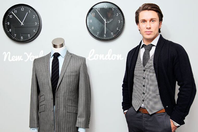 Michael Beaumont in his studio with one of his custom suits; they're seen on "Super Fun Night." (Michael Bryant/Staff Photographer)