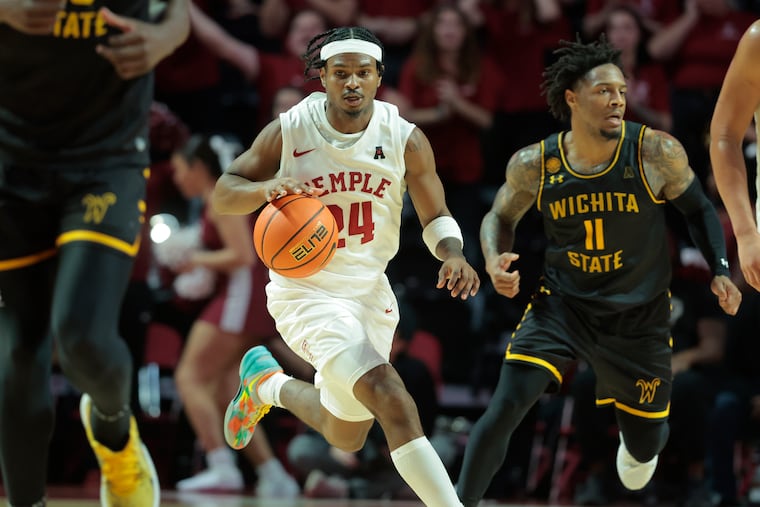 Temple's Jamal Mashburn, Jr., center, was named Player of the Week by the U.S. Basketball Writers Association on Monday.