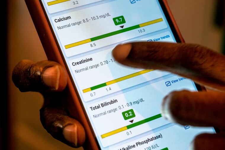 Katherine Anderson's kidney transplant was delayed because an organ transplant algorithm made it less likely that Black patients would be approved for a transplant. A new study from the University of Pennsylvania recently examined dozens of studies on similar health care algorithms and found that race is an imprecise metric to use when determining care. In this 2023, photo, Anderson of Norristown shows some blood test results.