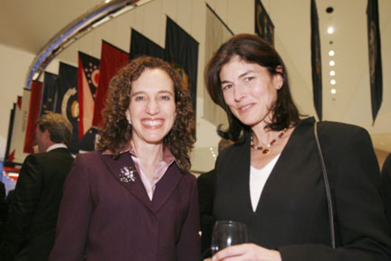 Eisner (left) with Kayce Freed Jennings, widow of Peter Jennings, in a 2007 photograph from the inaugural for the Peter Jennings Project for Journalists and the Constitution at the Constitution Center