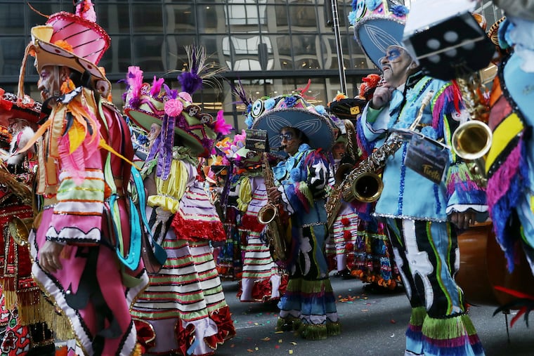 Durning String Band members wait to perform in front of City Hall during the annual Mummers Parade in Philadelphia on Wednesday, Jan. 1, 2020.