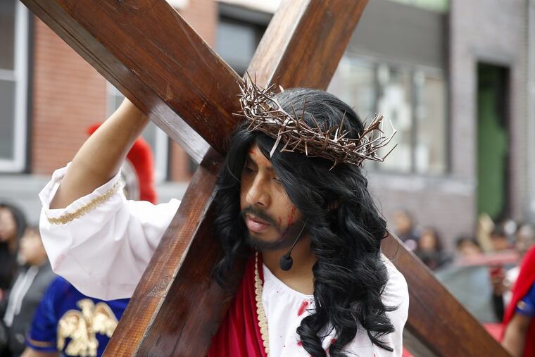 File: Jose Miguel portrays Jesus during the Stations of the Cross procession on Good Friday in Philadelphia on April 14, 2017.