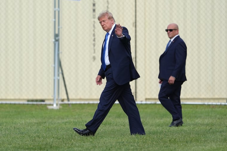 President Donald Trump walks to board his presidential limousine after arriving on Marine One from the Ellipse near the White House, Friday, Aug. 28, 2026, in Washington, on return from Houston.
